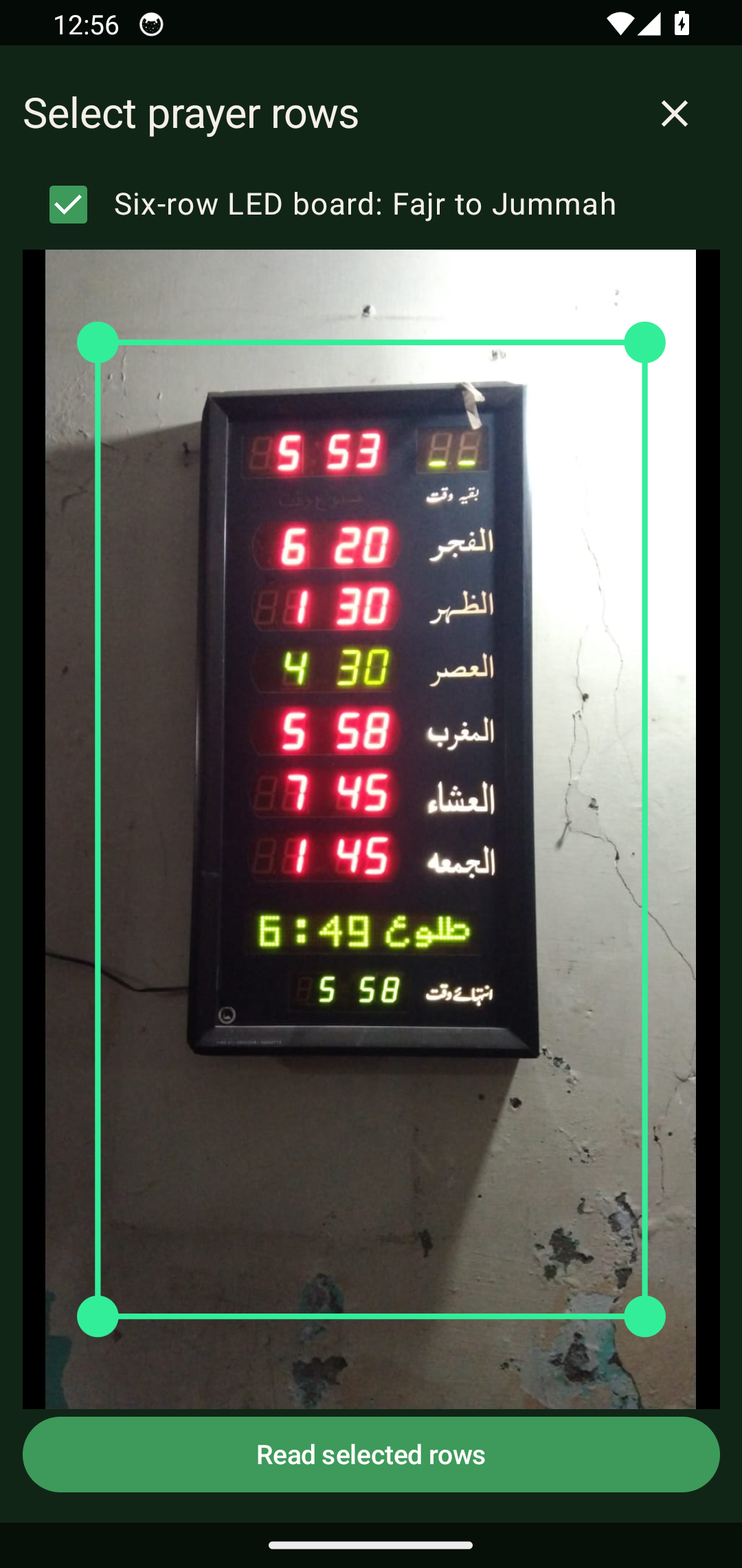 Crop tool selecting Arabic prayer rows on a Masjid LED board